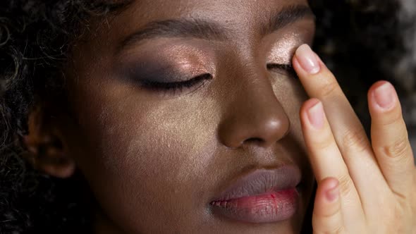 Close Up Shot of Beautiful African Model During Makeup