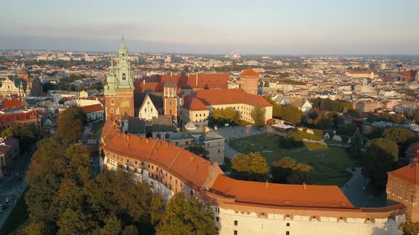 Aerial Drone View of Royal Wawel Cathedral and Castle at Sunset in Krakow, Poland. Vistula River alt