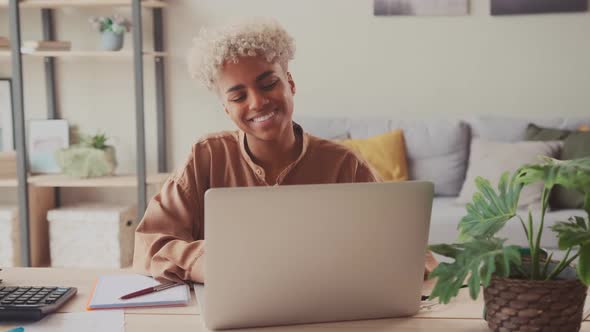 Smiling Young Interracial Business Woman Work Distant on Laptop alt