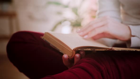 Woman Reads Book and Turning Pages. Woman Reading Book