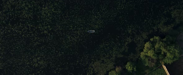 A Lonely Boat on the River