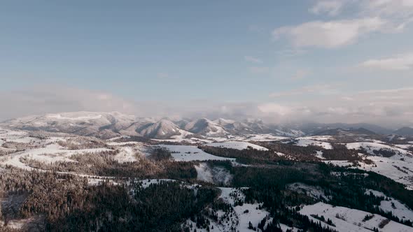 Aerial Drone View of a Snowy Carpathian Mountains in Ukraine alt