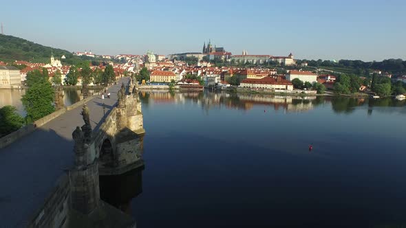 Aerial of the Vltava River with Charles Bridge 