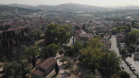 Cinematic Reveal Of Dukes Of Braganza Palace And Guimaraes Castle, Portugal, Pull Back Aerial