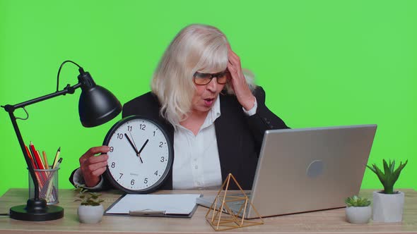 Senior Businesswoman with Anxiety Check Time on Clock Running Late to Work Being in Delay Deadline alt
