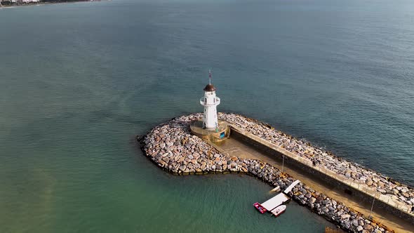 Lighthouse in the port aerial view alt