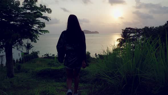 Cute Asian Girl in Kimono Walking to Beach at Sunset in Slow Motion Thailand