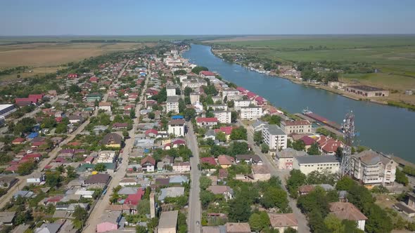 Aerial View Of Sulina City Harbor And The Danube Flowing Into The Black Sea alt