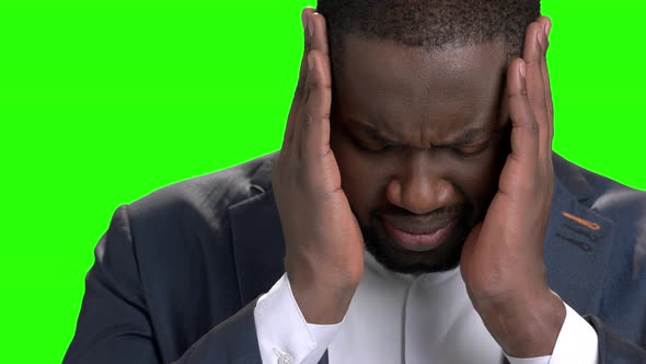 Tired and Depressed Businessman with Headache. alt