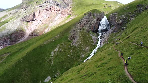 Aerial footage of a large waterfall near Elbrus mountain