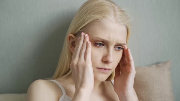 Upset Tired Woman Feel Pain Coping with Morning Headache Concept alt
