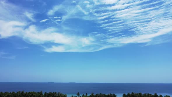 Aerial drone scenery of perfect shore beach vacation by clear water and white sandy background of a  alt