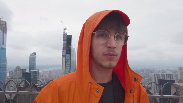 Caucasian man on Top of the Rock, New York City, Rockefeller center alt