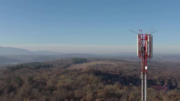 Valley under telecommunication tower aerial 4K video
