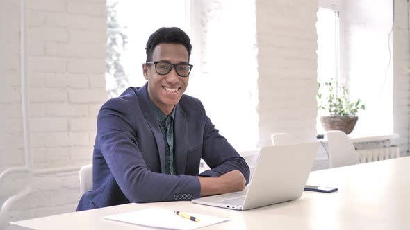 Smiling Businessman at Work Looking at Camera alt