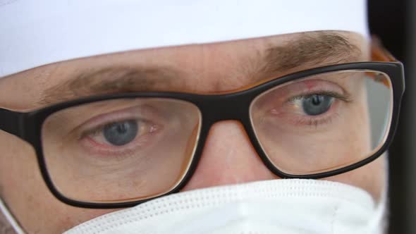 Overworked Health Workers with Protective Mask on Face alt