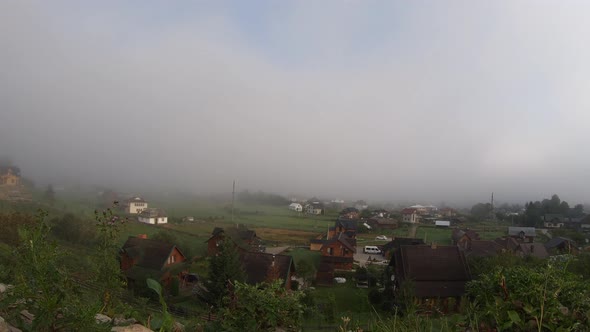 Morning Fog Dissipates in the Mountains alt