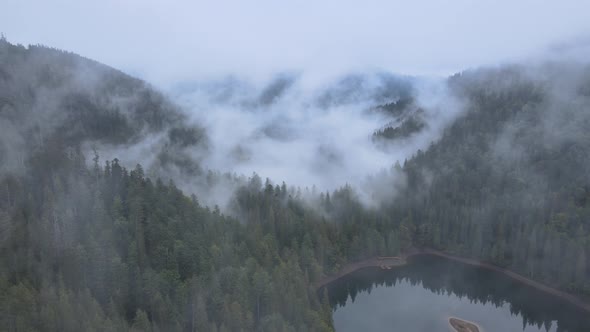 Fog in the Mountains. Aerial View of the Carpathian Mountains in Autumn. Ukraine alt