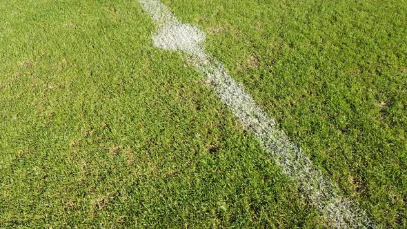 Soccer, Football field grass. Close up of the lines and grass on a soccer pitch. alt