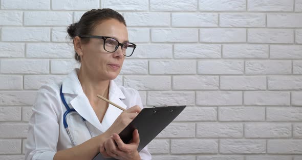 Doctor with Medical Form alt