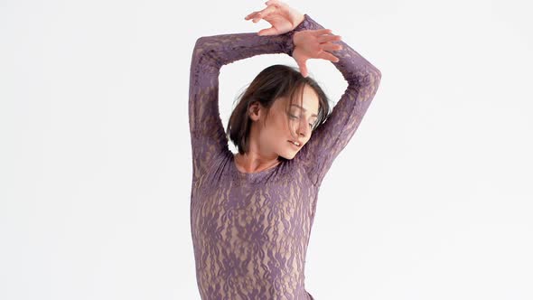 Young Woman in a Purple Dress Dancing Modern Contemporary Style alt