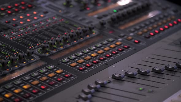 Faders And Lights Starts To Move In Vegas Mode On The Sound Board During A Music Festival In Ontario alt