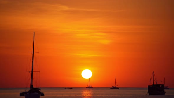 Sail boat in tropical sea at beautiful sunset alt