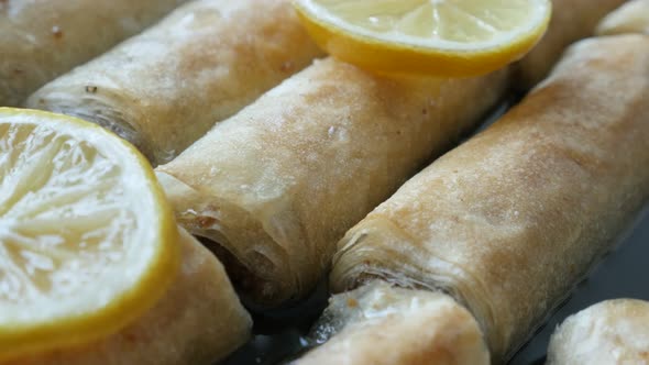 Turkish phyllo pie baklava filled with walnuts  panning 4K 2160p 30fps UHD footage - Sweet sugar syr alt