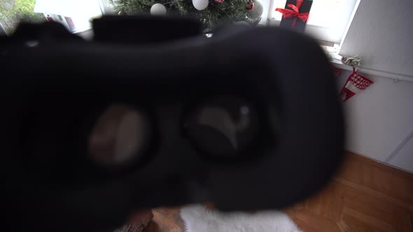 3d Glasses Watching Virtual Reality in Headwear Near Xmas Tree