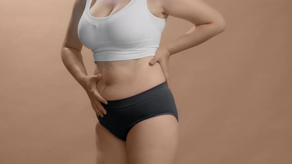 Full Figured Caucasian Female in Underwear Appreciate Her Forms and Show Thumbs Up