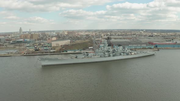 Aerial Drone Shot of USS New Jersey in River Between Camden and Philadelphia