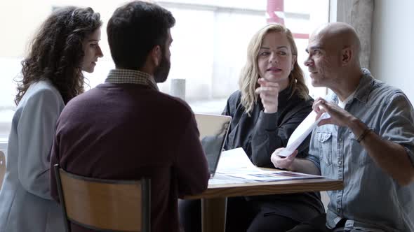 Confident Interior Planners Choosing Color for Walls alt