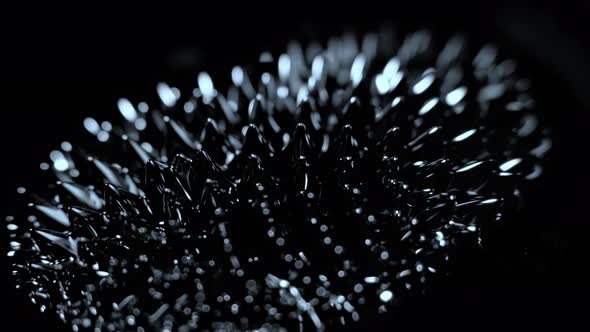 Super Slow Motion Macro Shot of Magnetic Liquid Ferrofluid in Motion at 1000Fps alt