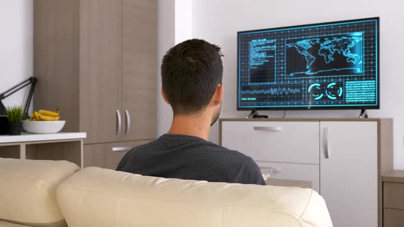 Back View of Adult Man Gaming on the Console alt