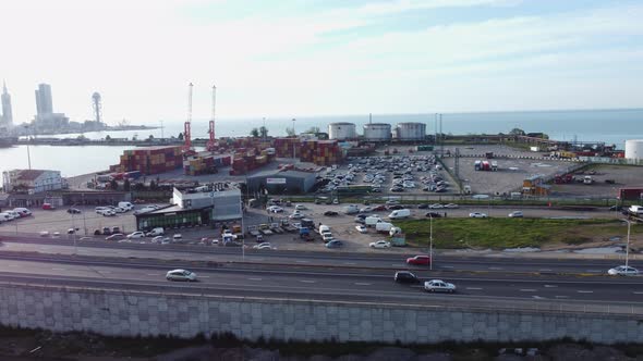 Aerial top view of cargo ship standing in the port alt