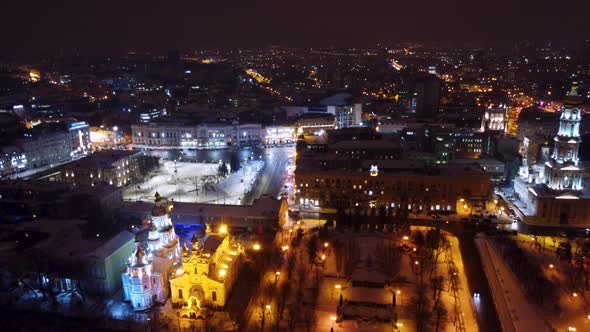Winter night Kharkiv city center square aerial