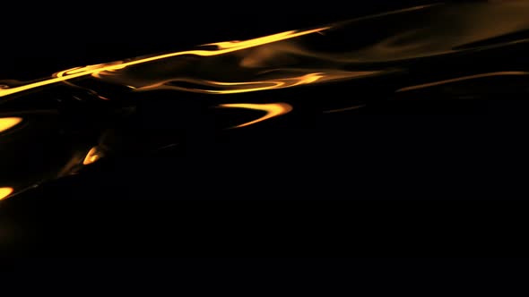 Super Slow Motion Shot of Flowing Golden Water at 1000Fps Isolated on Black Background alt