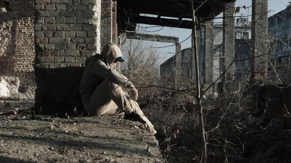 Soft Focus A Young Man In A Ruined House, A Lonely And Sad Guy Sits In A Ruined House alt