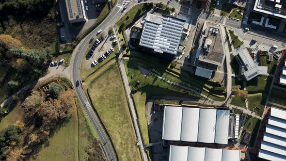 Aerial view of vehicles driving a countryside road, Reggello, Florence, Italy. alt