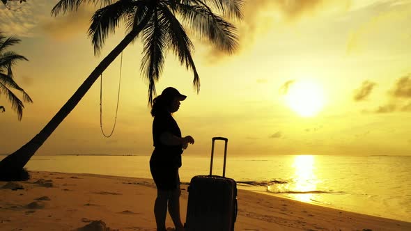 Lady loves life on relaxing shore beach adventure by blue green sea and white sandy background of th alt
