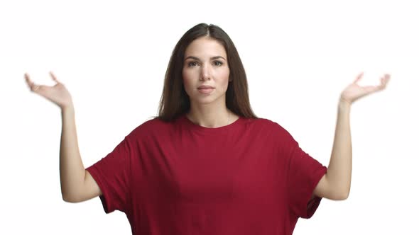 Video of Attractive Caucasian Girl in Red Tshirt Looking Excited and Happy Rejoicing From Good News alt