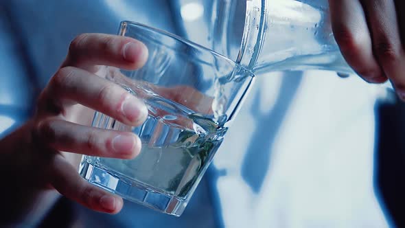 Barman Pours Mojito Into the Glass. Slow Motion. alt