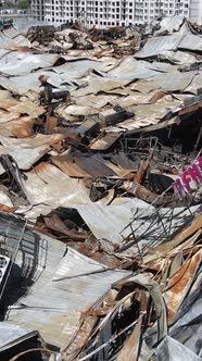 Vertical Video of a Destroyed Building of a Shopping Center in Bucha Ukraine alt