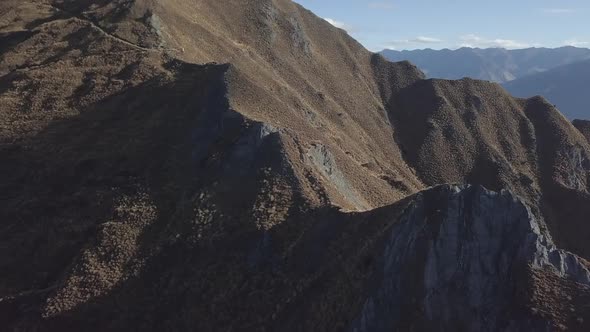 Range of peaky mountains in sunshine alt