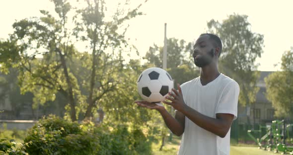 Amateur Football Player Performs Tricks with the Soccer Ball alt