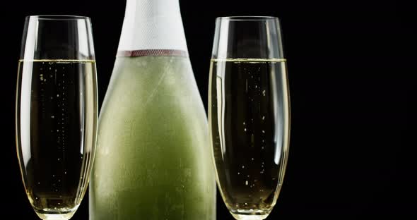 Champagne Bottle and Flutes