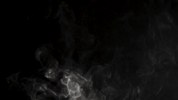 White Steam Rises Light on Black Background