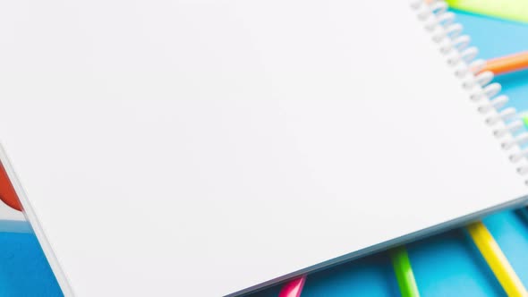 School Supplies for the First of September are on a Pastel Blue Background alt