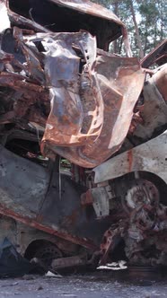 Vertical Video of Burnt Cars During the War in Ukraine alt