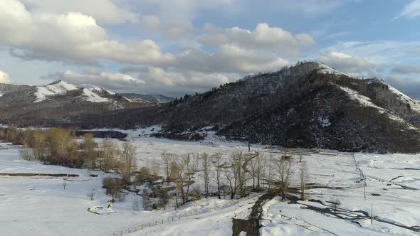 Flight To Mountains Under Blue Sky alt
